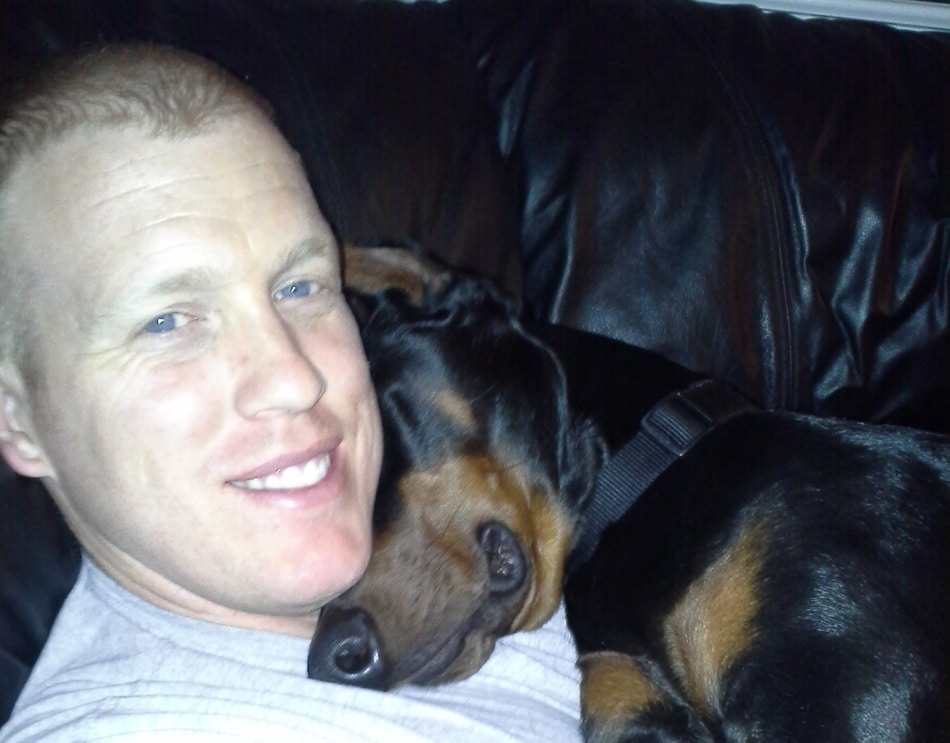 My Doberman asleep on me.